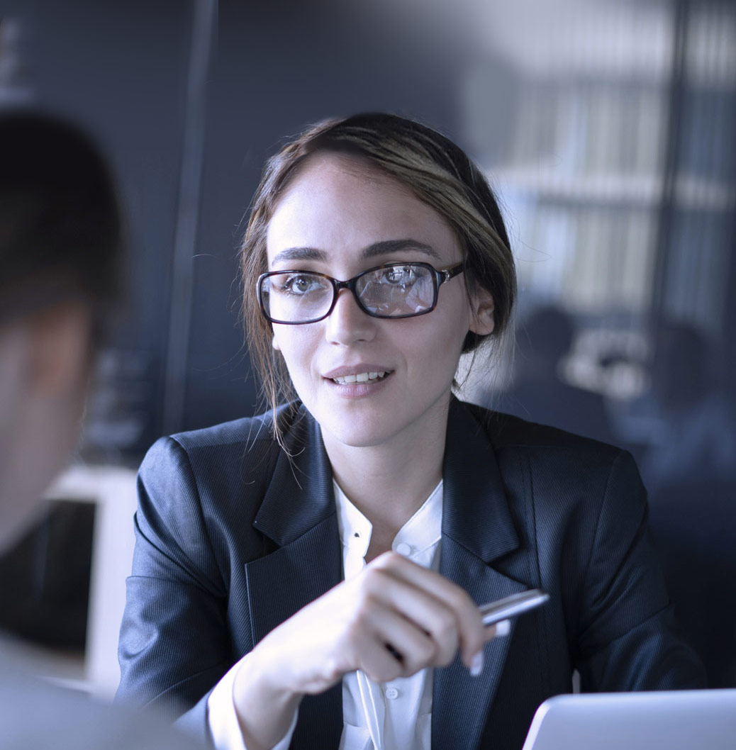 Woman talking with colleague